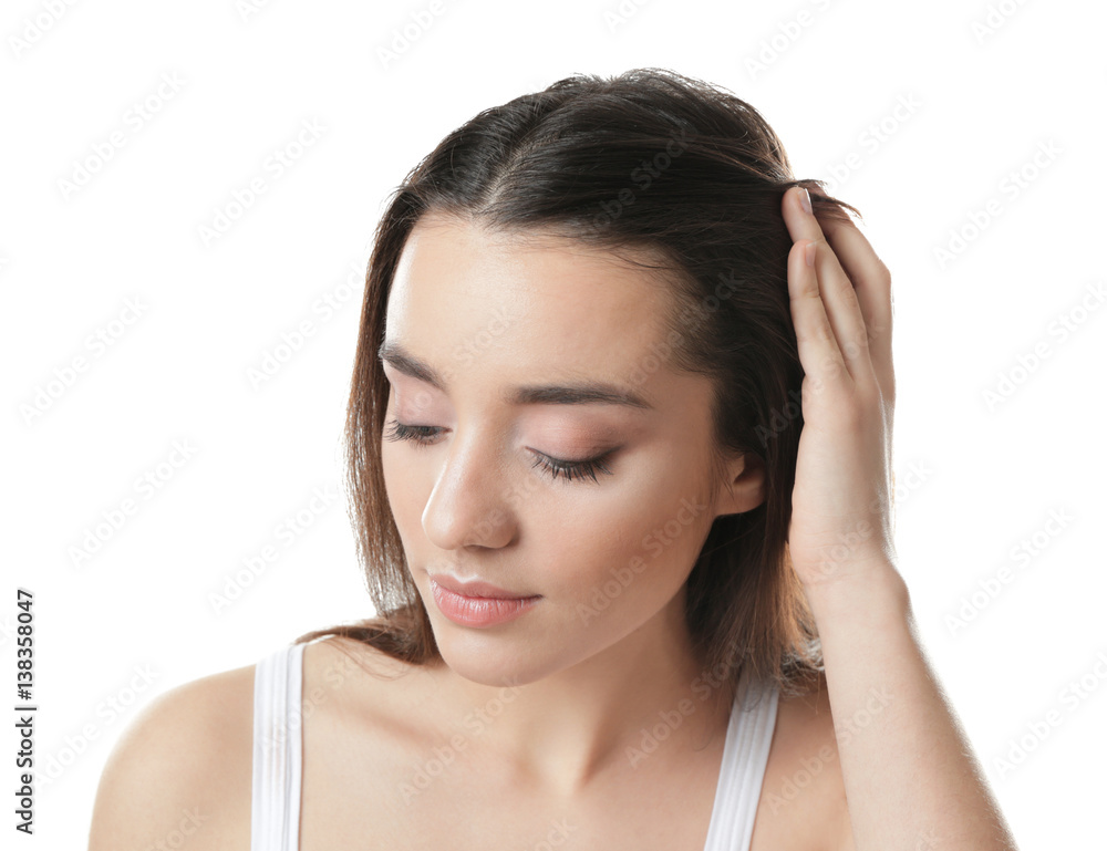 Young woman with hair loss problem on white background Young woman with hair loss problem on white background