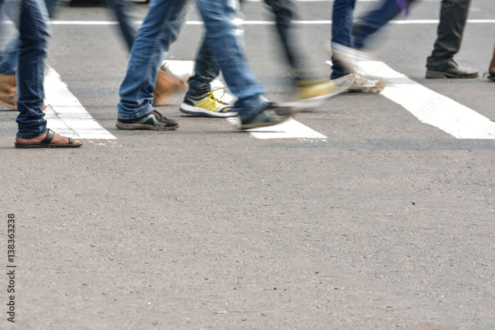 Pedestrian are crossing in zebra crossing Pedestrian are crossing in zebra crossing