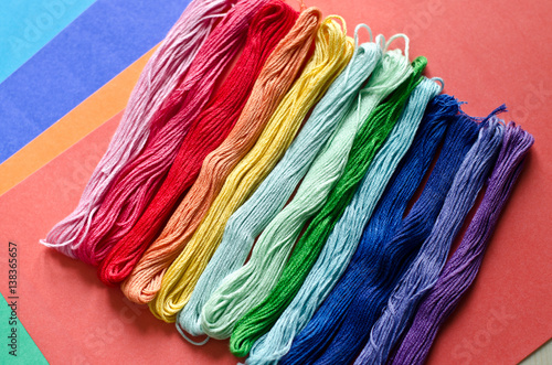 Embroidery floss on a colored background