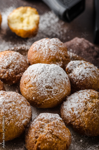 Homemade donuts with sugar and gun