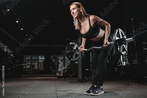 young sexy fitness woman train and exercising in gym healthy