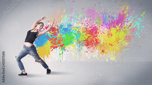 Young colorful street dancer with paint splash © ra2 studio