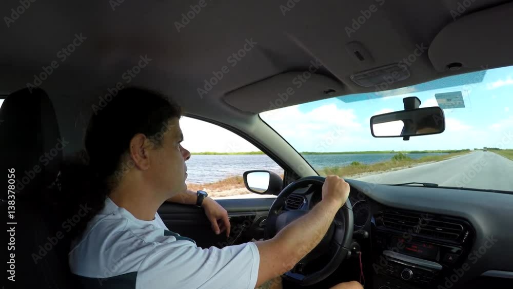 Tourist is driving car on the artificial sea dam (Cayo Santa Maria direction). Cuba Tourist is driving car on the artificial sea dam (Cayo Santa Maria direction). Cuba