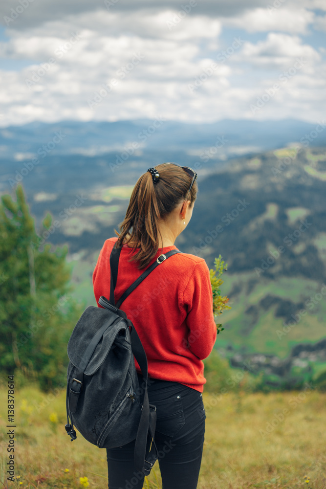 Girl is travelling in mountains