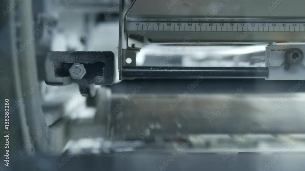 Envelopes on the assembly line in a factory with stroboscopic light Envelopes on the assembly line in a factory with stroboscopic light
