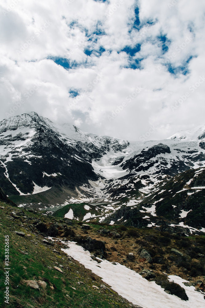 Snowy mountain in Swiss Alps. Summer landscape