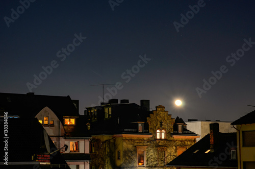night cityscape with big moon © AlexaSokol83