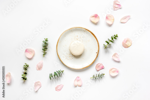 woman breakfast with rose and macaroons white table top view