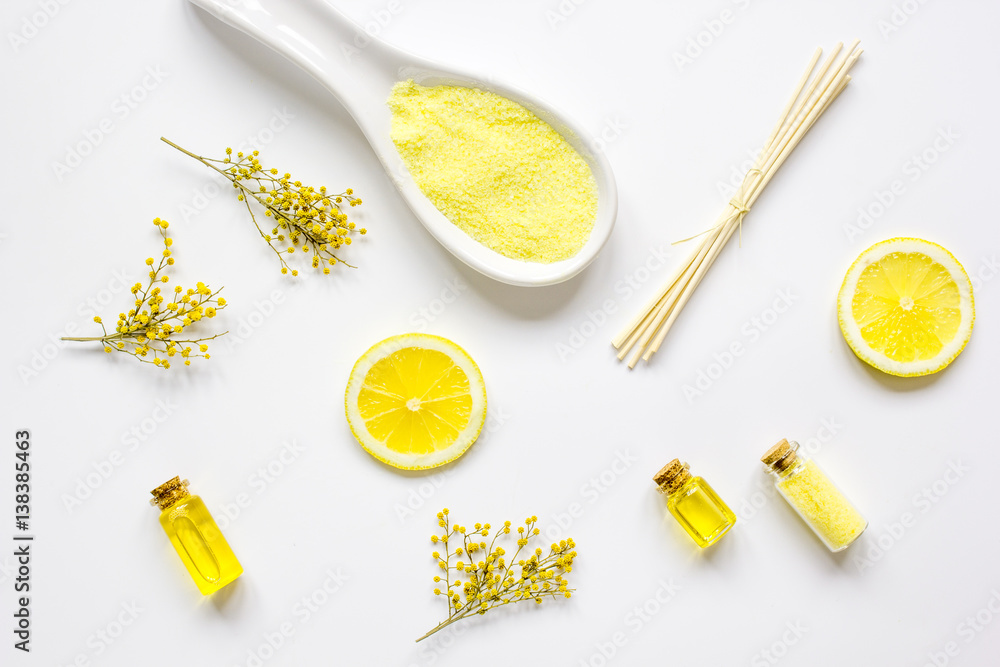 Spa cosmetic set with oils and salt on white background top view Spa cosmetic set with oils and salt on white background top view