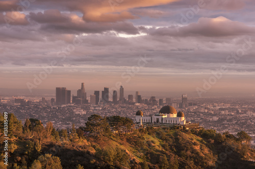 Fotografie, Obraz Griffith Observatory and Los Angeles city skyline at sunset