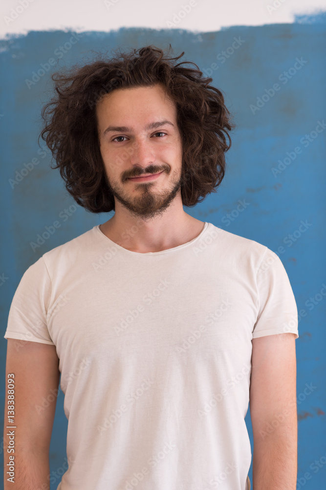 young man with funny hair over color background young man with funny hair over color background