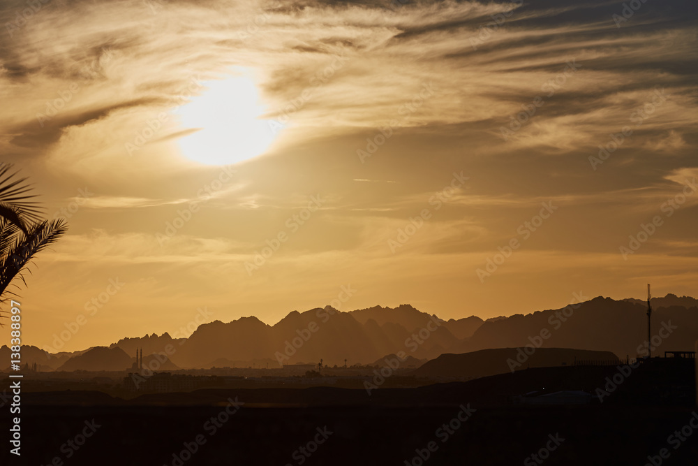 sunset sea and mountains