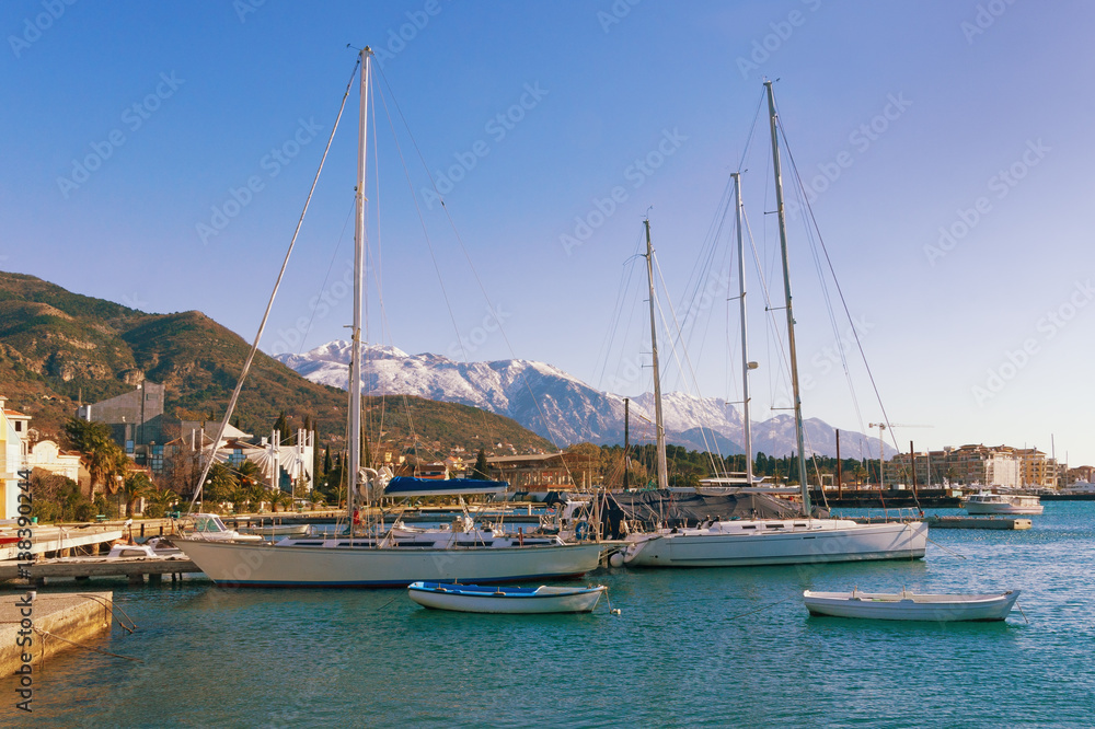 Boats in the dock on a sunny day. Bay of Kotor, Tivat, Montenegro