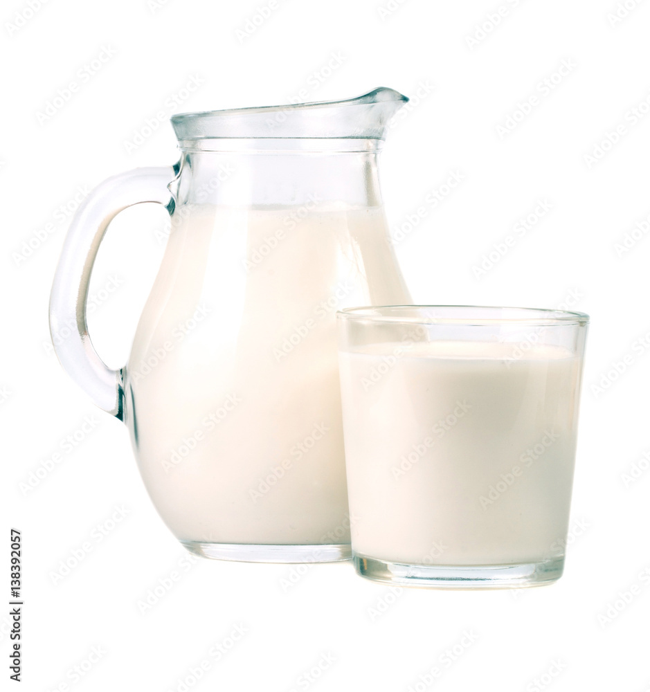 jug and glass of milk isolated on white background jug and glass of milk isolated on white background