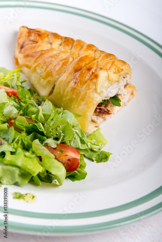 Chicken breast in french pastry with fresh salad