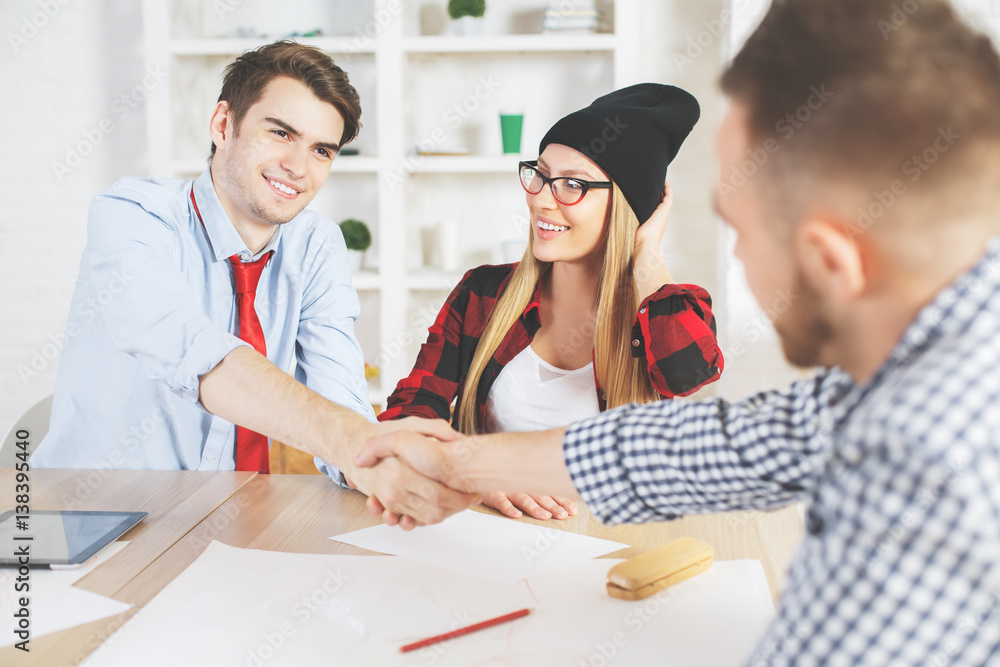 Obraz premium Young guy accepted for a job