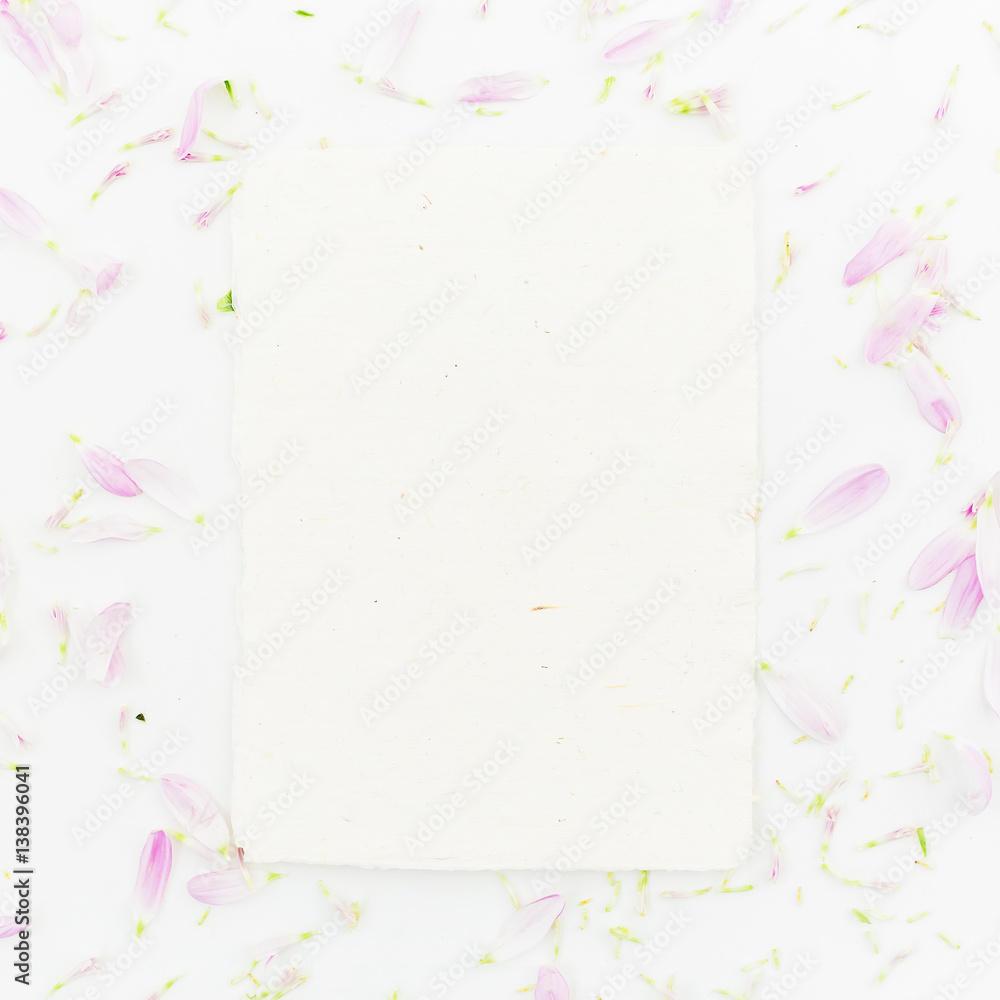 Gentle pattern of pink flowers and paper card isolated on white background, Flat lay, Top view. Art background Gentle pattern of pink flowers and paper card isolated on white background, Flat lay, Top view. Art background