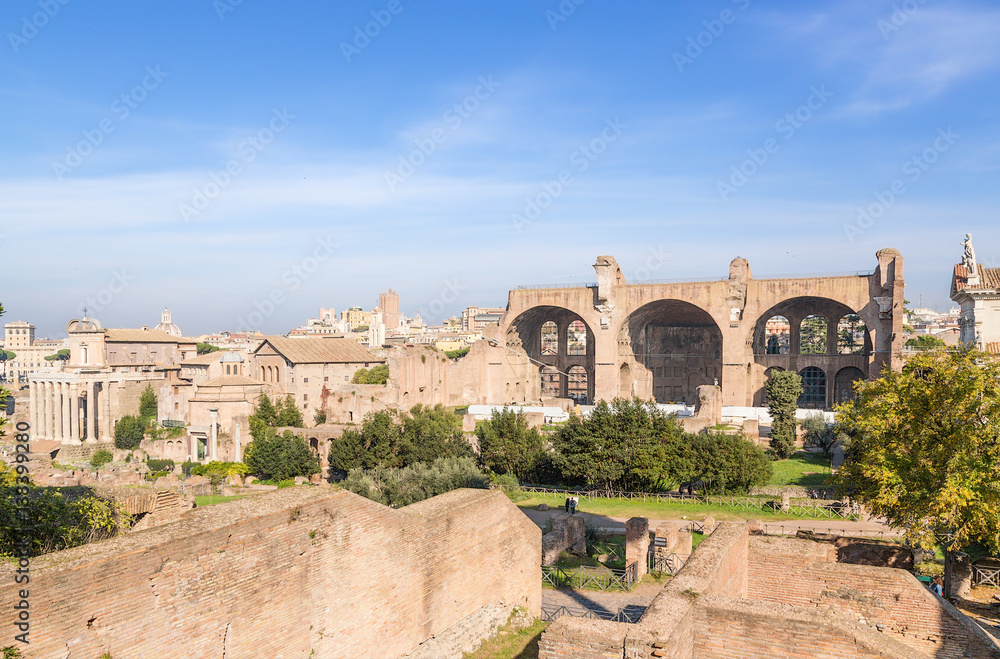 Rome, Italy. View of ruins of Roman Forum, from left to right: Temple of Antoninus and Faustina (141 AD)., Romulus Temple (307 AD), Basilica of Maxentius and Constantine, 308 AD