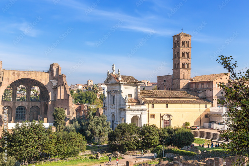 Rome, Italy. Roman Forum: the ruins of the Basilica of of Maxentius and the Church of Santa Francesca Romana