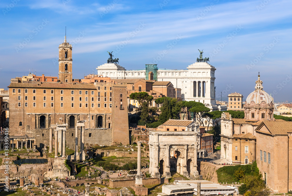 Rome, Italy. From left to right: the temple of Saturn, Tabularium (Senators Palace), Temple of Vespasian, the arch of Septimius Severus, Mamertinum, the Curia Julia