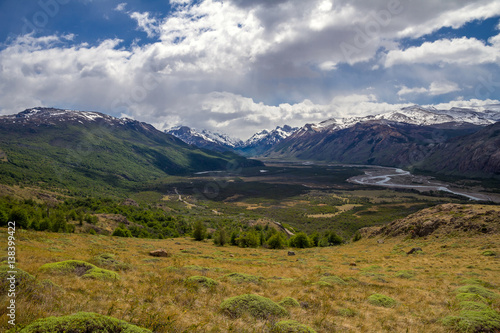 Argentina  Patagonia  El Chalten area. Trekking to the Laguna Capri and Fitz Roy Mountain. Landscape view to the river Rio de las Vueltas valley. Sky with the clouds.