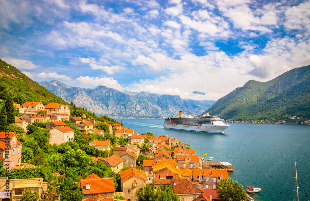 Beautiful mediterranean landscape. Cruise ship near town Perast, Kotor bay (Boka Kotorska), Montenegro.