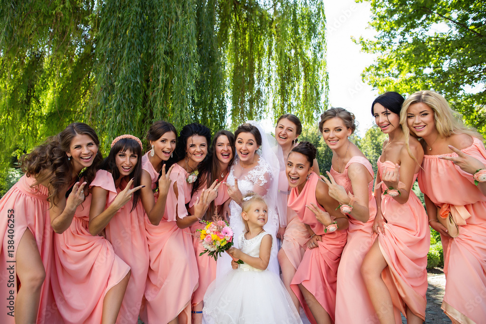 Wedding party, crazy emotions of bride, child with wedding bouquet and beautiful bridesmaids. Stylish guests on wedding Wedding party, crazy emotions of bride, child with wedding bouquet and beautiful bridesmaids. Stylish guests on wedding