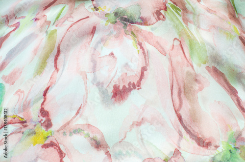 Fabric silk texture, abstract flowers drawn on the fabric photo