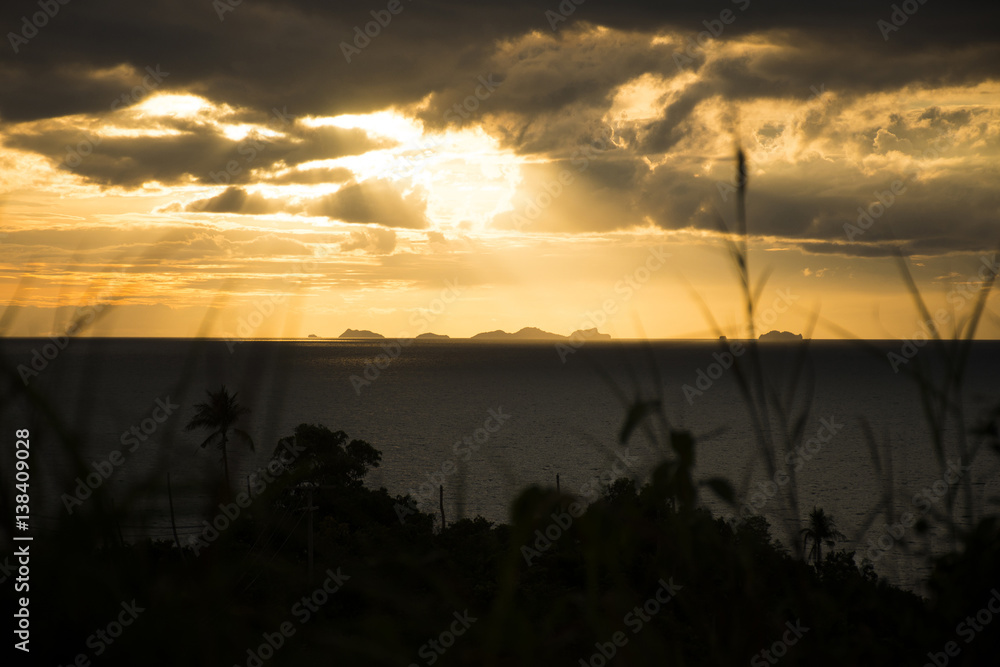 Panoramic sunset by the sea island Koh Phangan with Ang Thong Marine Park background Thailand