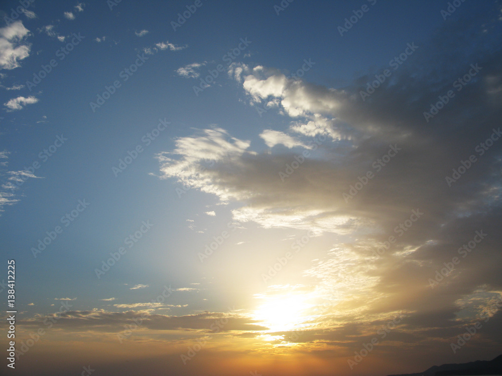 Fantastic golden sunset horizon sky clouds photo