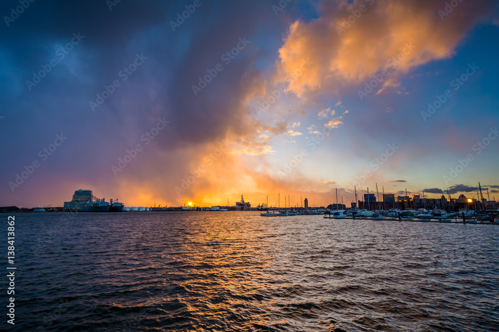Dramatic sunset over the Patapsco River, at the Canton Waterfront, in Baltimore, Maryland. Dramatic sunset over the Patapsco River, at the Canton Waterfront, in Baltimore, Maryland.
