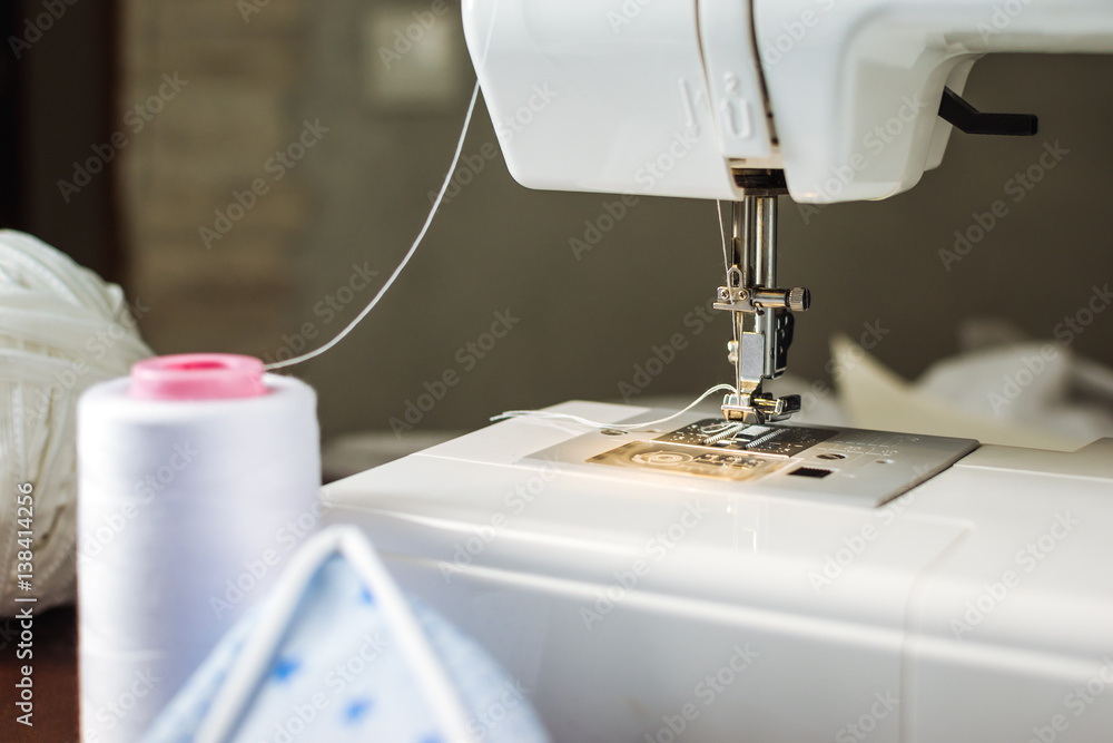 Sewing machine with fabric, close up view