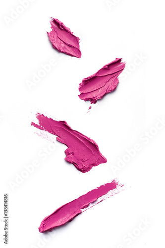 Smudged pink color lipstick on background