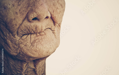 Fototapeta Closeup mouth of elderly woman toothless with space to add text