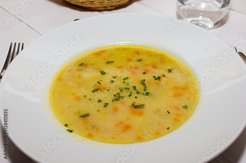 Soup with broth and carrots