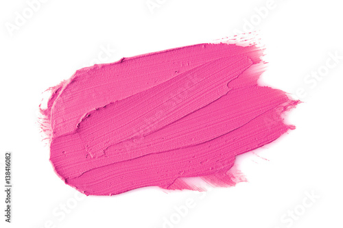 Pink color lipstick stroke on white paper