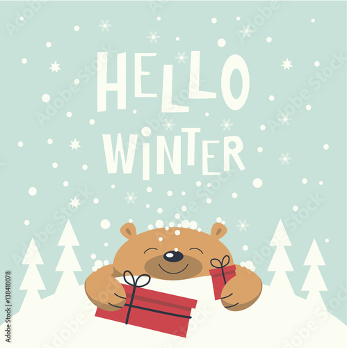 Christmas card. Brown bear lies on a snowdrift holding gift boxes in paws. Christmas trees on the snowdrift . Snowflakes falling. Phrase hello winter.
