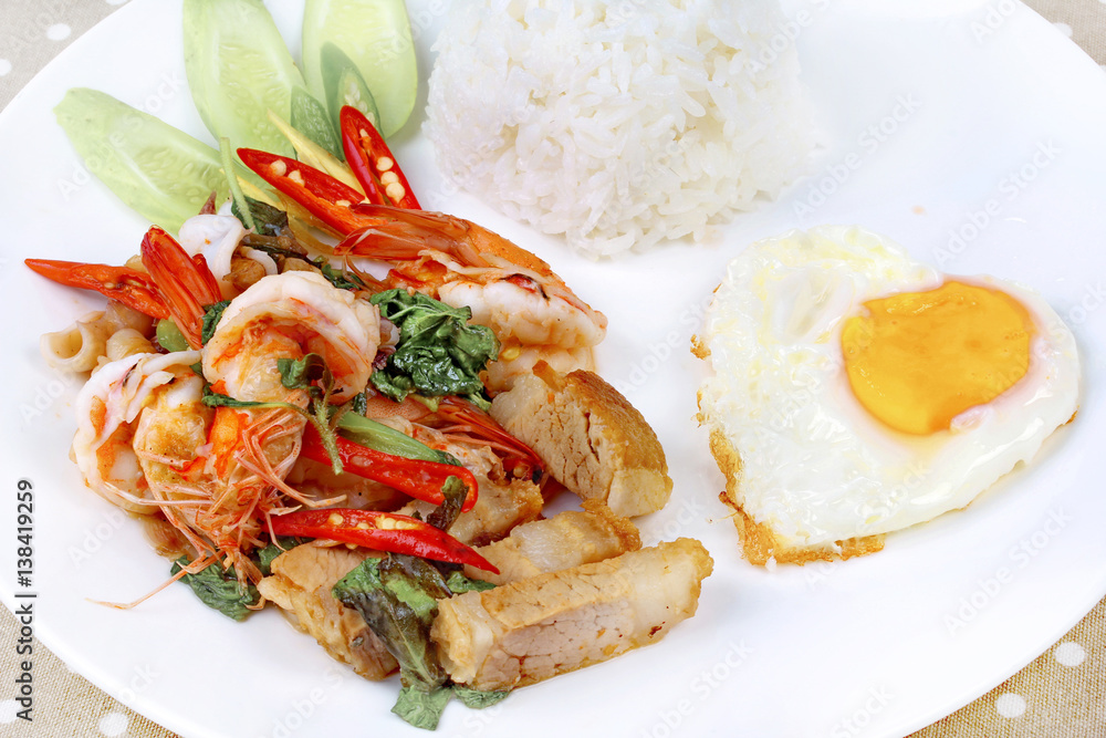 Jasmine rice topped stir - fried spicy basil with meat. Jasmine rice topped stir - fried spicy basil with meat.