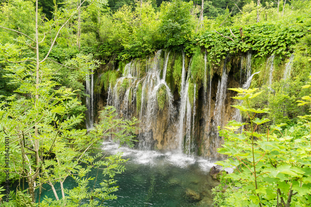 View overlooking waterfalls cascading down the karst formations in Plitvice Lakes National Park near Entrance 1 on the H trail. View overlooking waterfalls cascading down the karst formations in Plitvice Lakes National Park near Entrance 1 on the H trail.