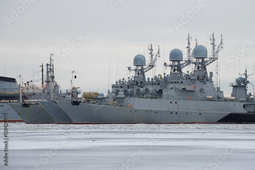Three small anti-submarine ship of the Baltic Navy on the winter Park, cloudy January day. Kronshtad