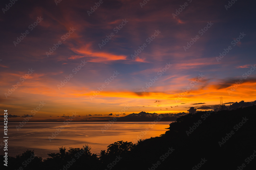 Sunrise over an island