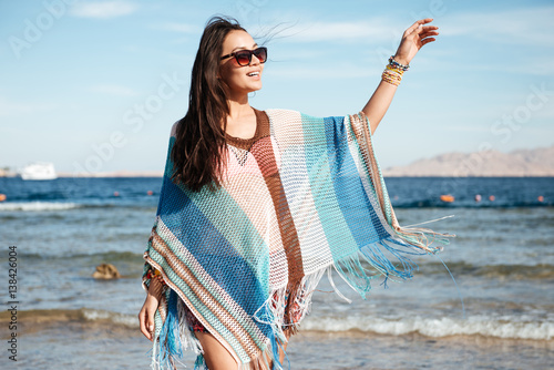 Side view of Woman in beachwear on the beach