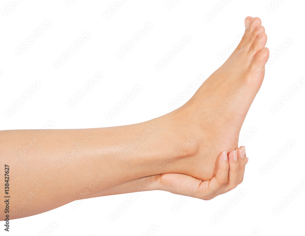 Woman cares about her feet on white background