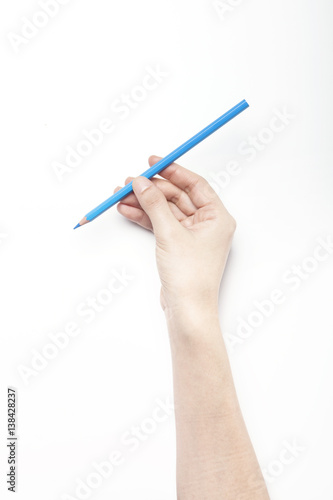 A woman hand hold a blue color pencils isolated white.