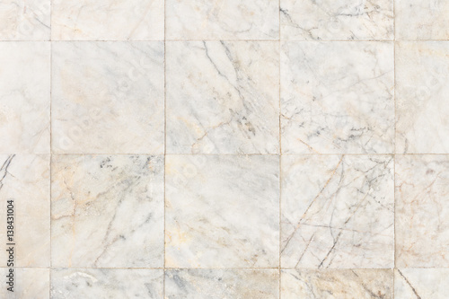 Real marble floor tile in top view with beige abstract texture pattern of natural material i.e. stone, rock. Smooth surface for decorative wall, floor of interior building i.e. bathroom, kitchen.