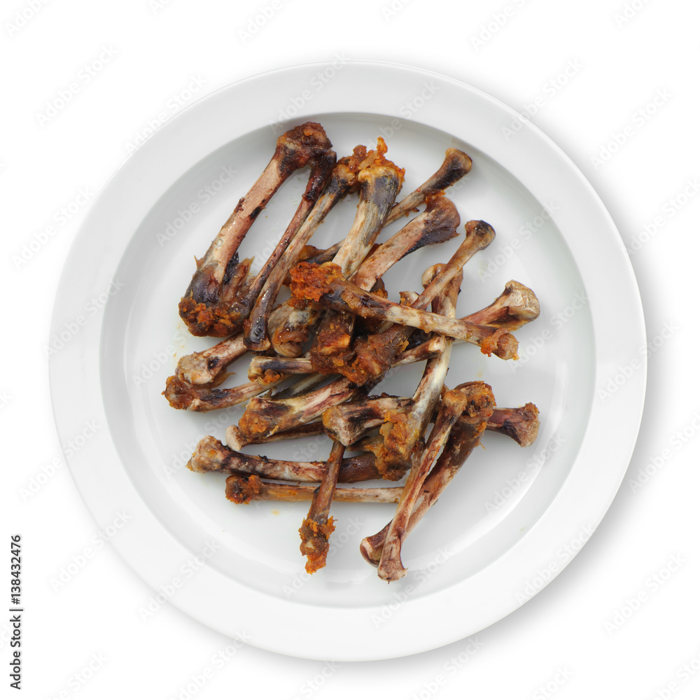 Bones chicken on a white dish