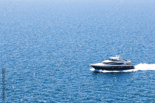 boat on the blue sea © Konstantin