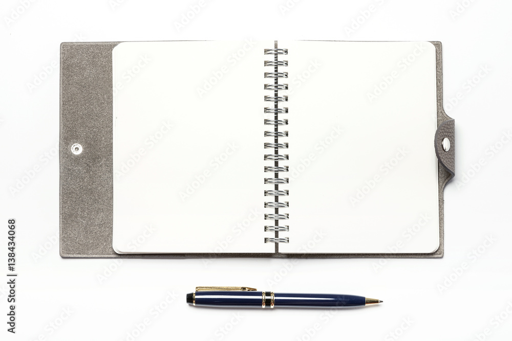 A empty(blank) note with leather cover, pen isolated white. A empty(blank) note with leather cover, pen isolated white.