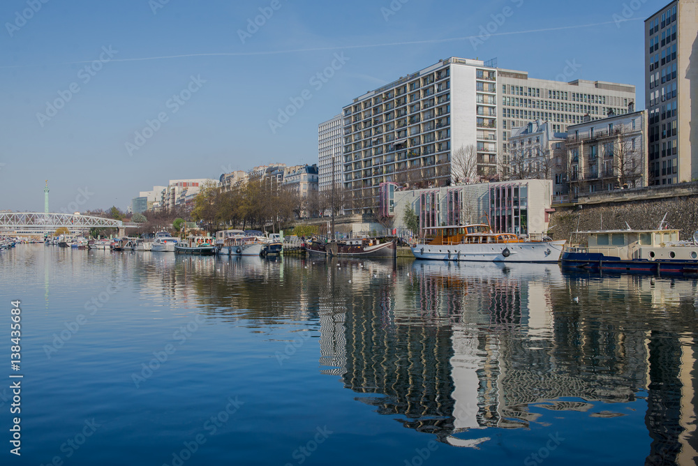 Paris, Bastille, harbor, houseboats and view on statue Paris, Bastille, harbor, houseboats and view on statue