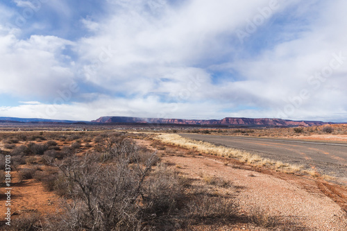 Clouds over desert highway